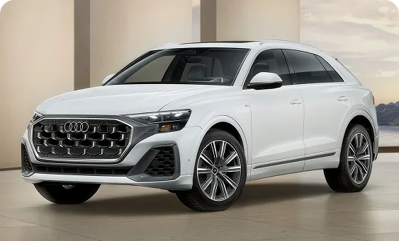 White 2027 Audi Q8 Prestige parked in a studio setting