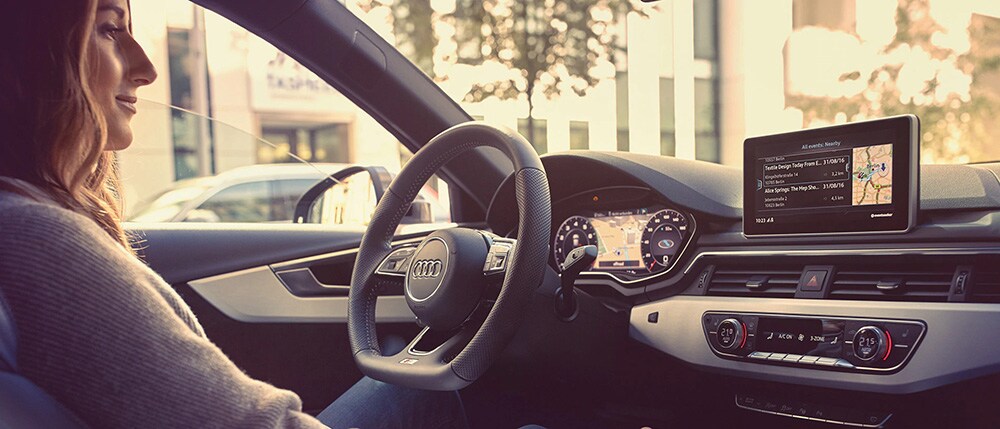Lady in a Audi vehicle