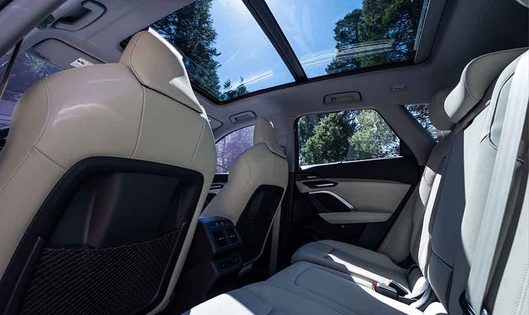 Interior view panoramic sunroof and 40/20/40 split-folding rear seats.