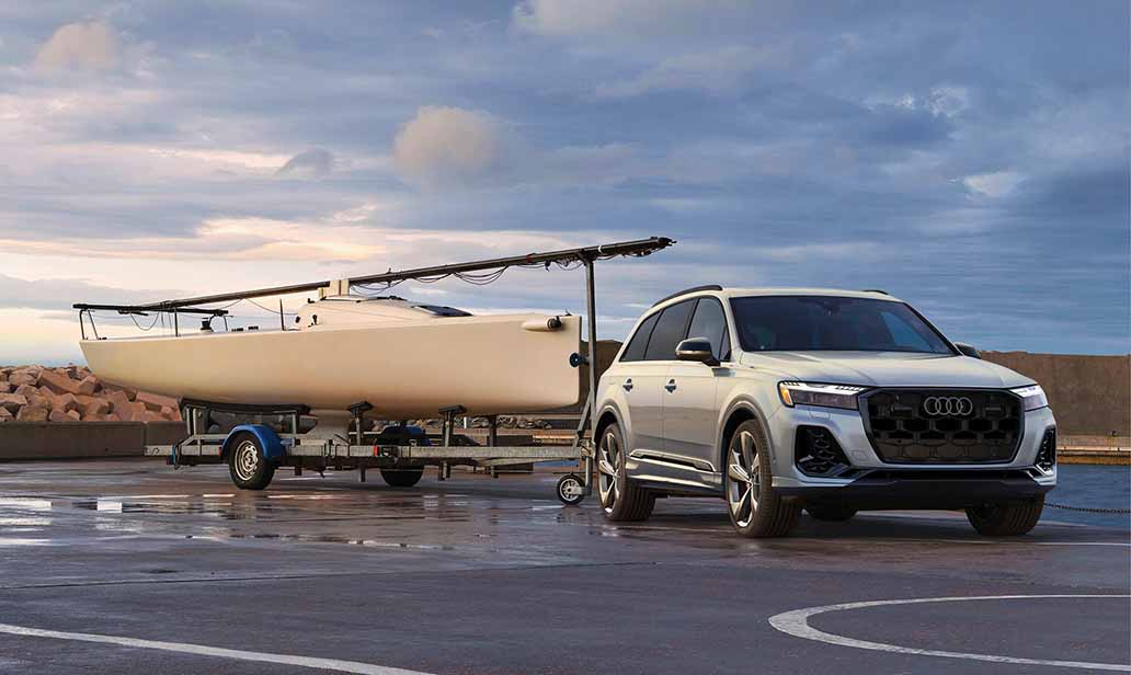 The all-new 2025 A5 driving with coastal background