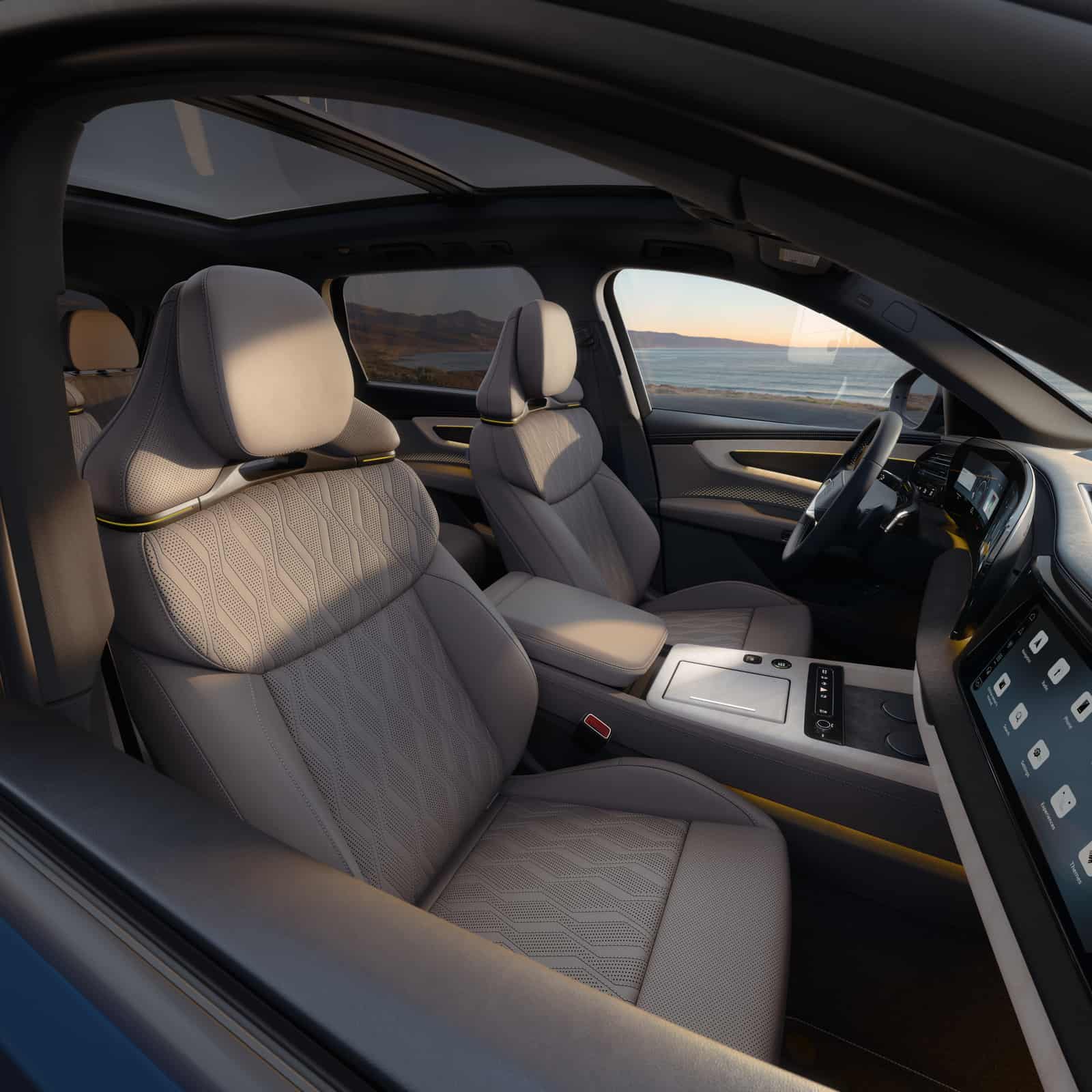 2027 Audi Q9 front seats, center console, and curved display seen through the open passenger door