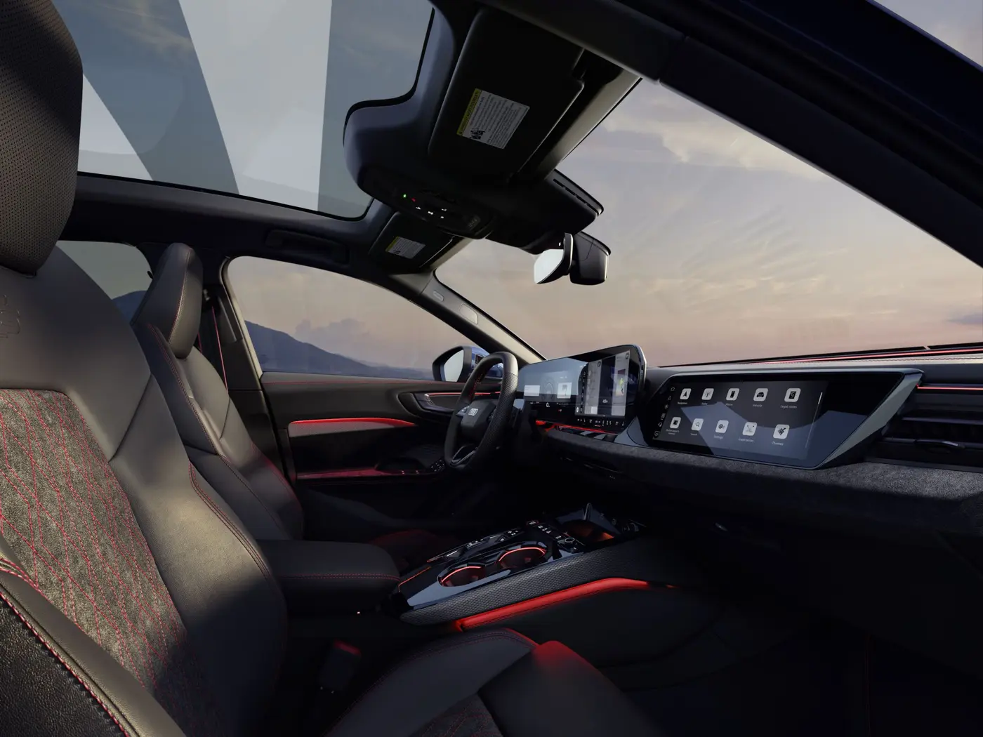 2027 Audi A5 cabin viewed toward the passenger side beneath the panoramic roof