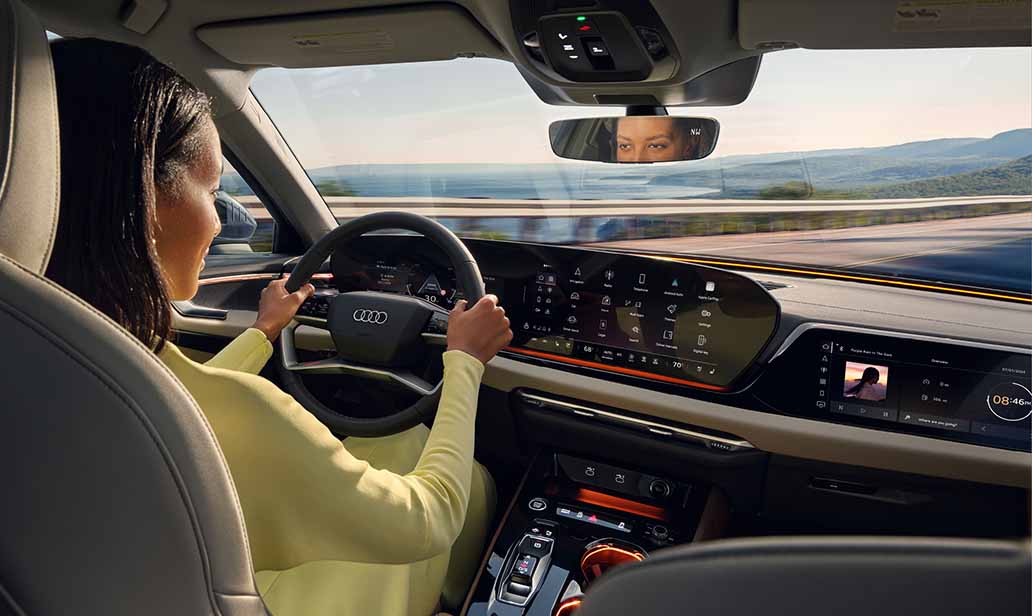 Woman driving in the 2025 all-new Audi A5