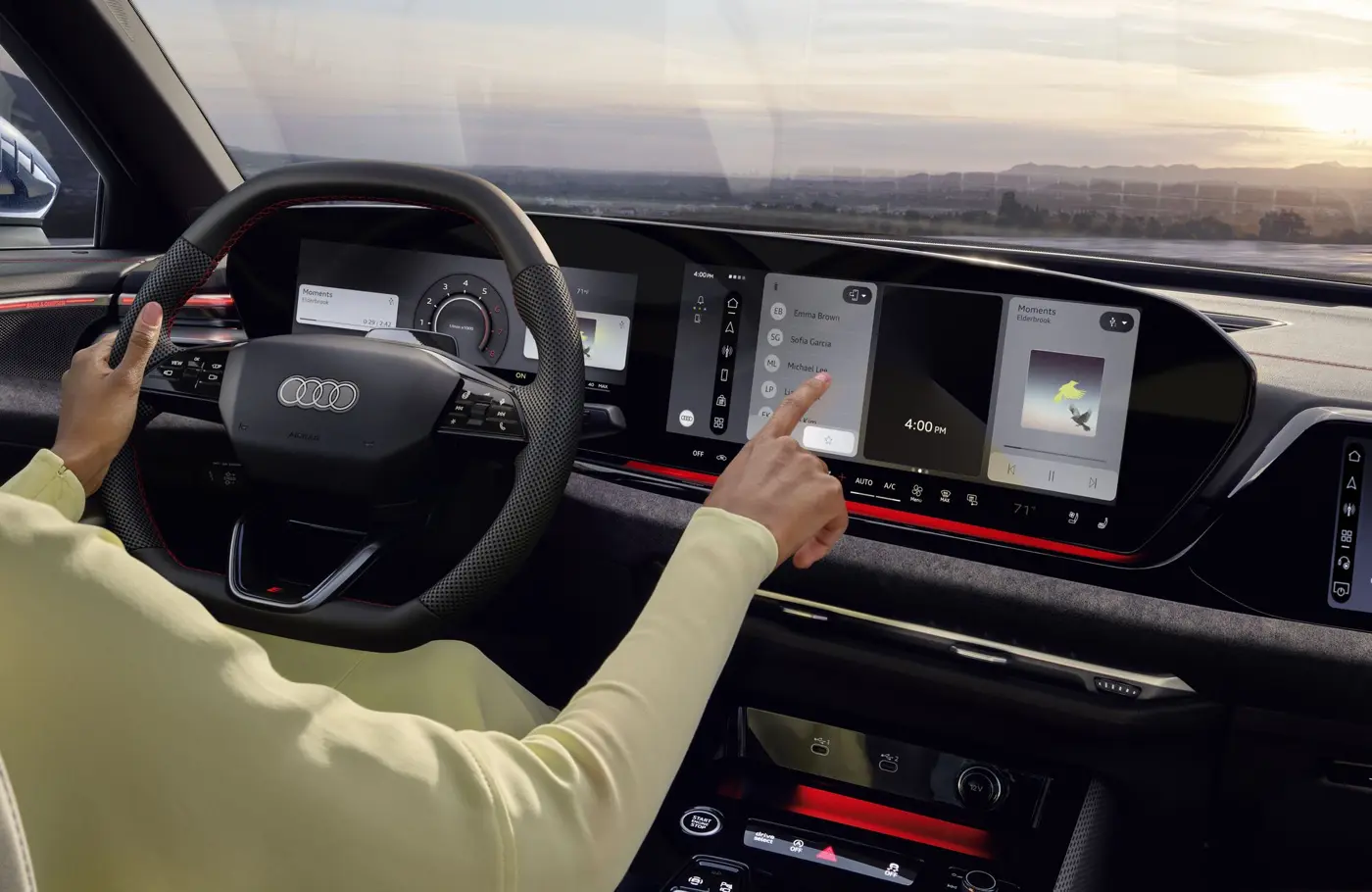 Driver using the 2027 Audi A5 MMI touch display