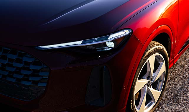 Close-up of the 2025 Audi Q5 headlight design and front fender.