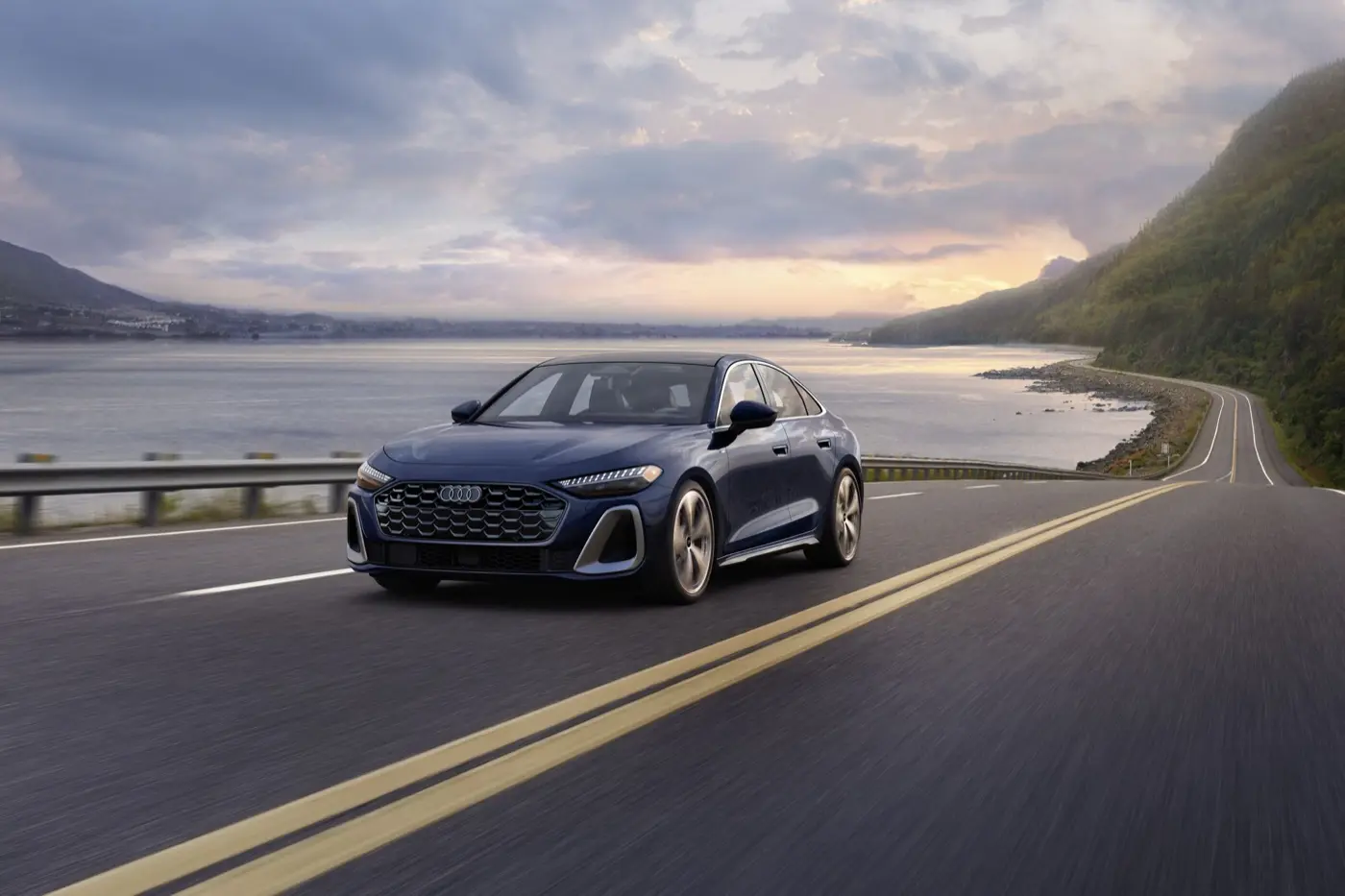 2027 Audi A5 driving along a coastal highway
