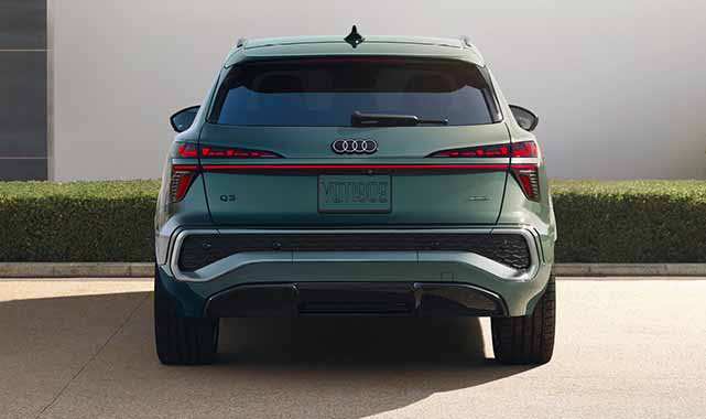 Audi Q3 symmetrical tail light bar and sleek design.
