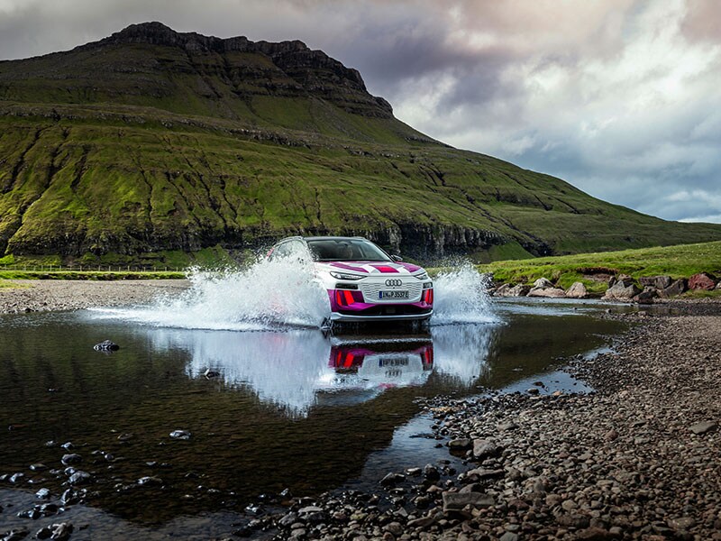 2023 Audi Q6 e-tron driving in a puddle