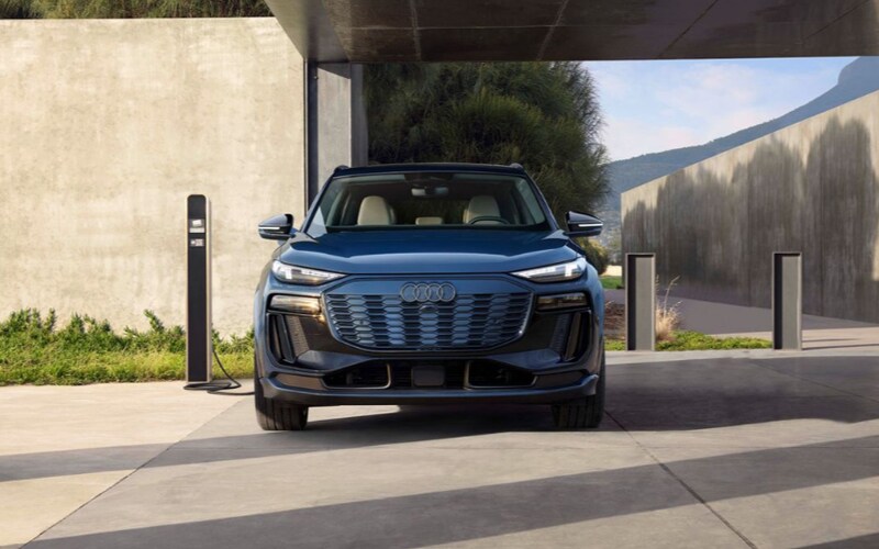Front of the 2025 Audi Q6 e-tron on the road in a tunnel
