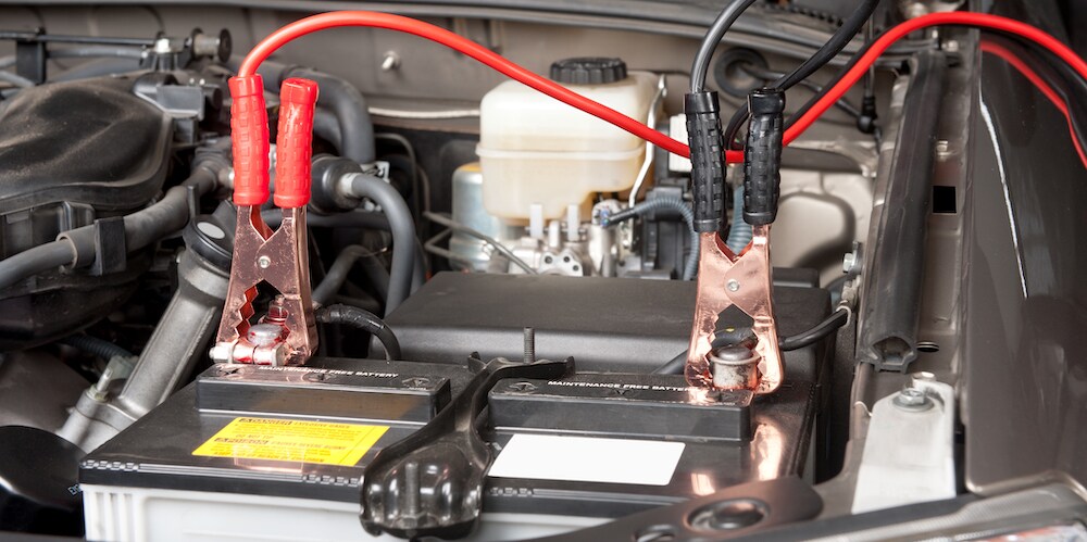 Car Battery with Jumper Cables