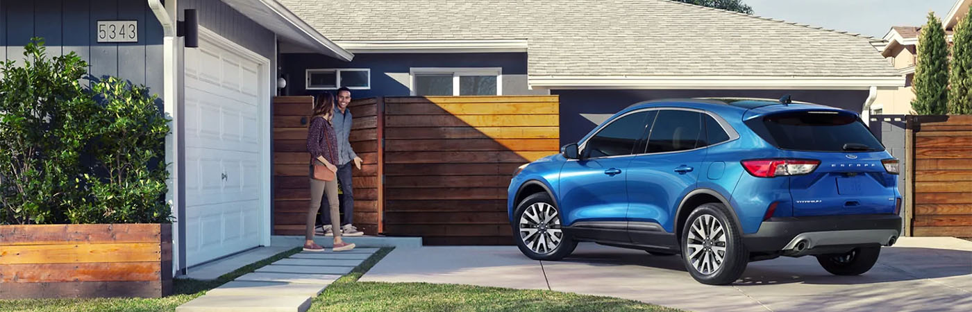 Couple walking to Ford Escape