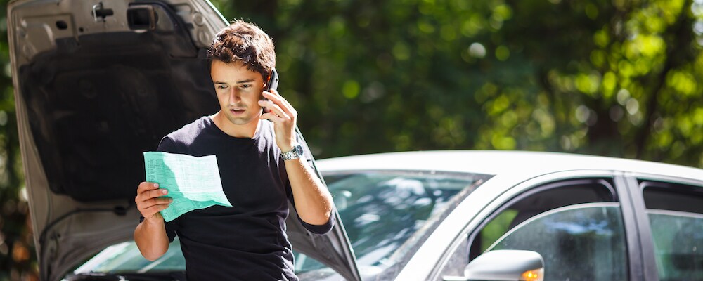 Man Calling Roadside Assistance