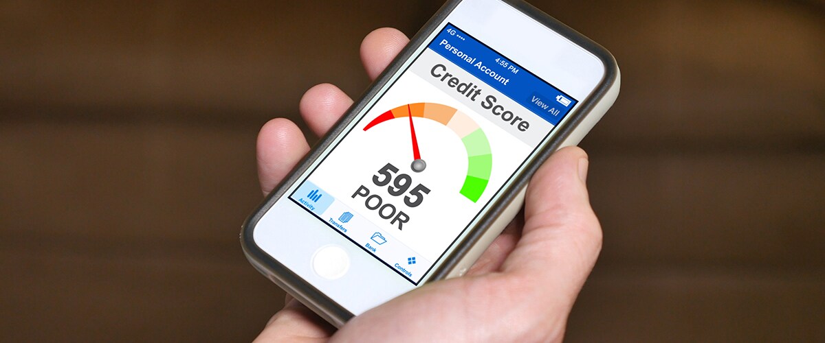 Man checking credit score on phone app