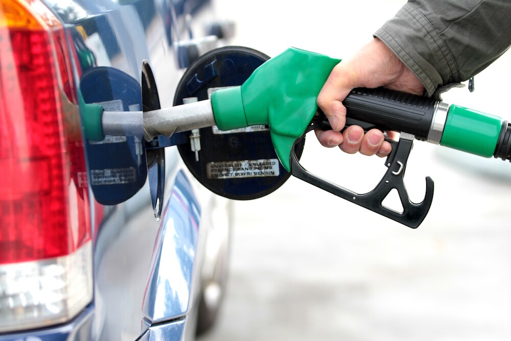 Green Gas Pump Filling Car