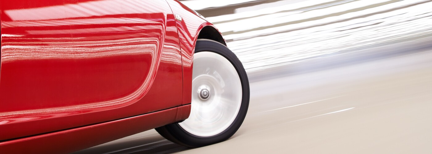 Red Car Turning Sharply