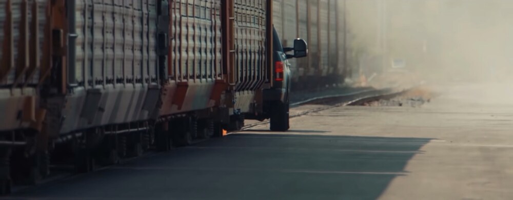 Electric Ford F-150 Towing a Train