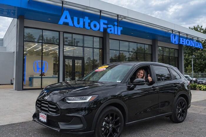 Happy owner of an AutoFair Certified vehicle