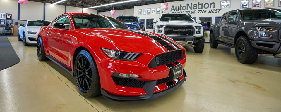 AutoNation Ford Amherst Showroom New Ford Mustang and Ford Raptor trucks for sale