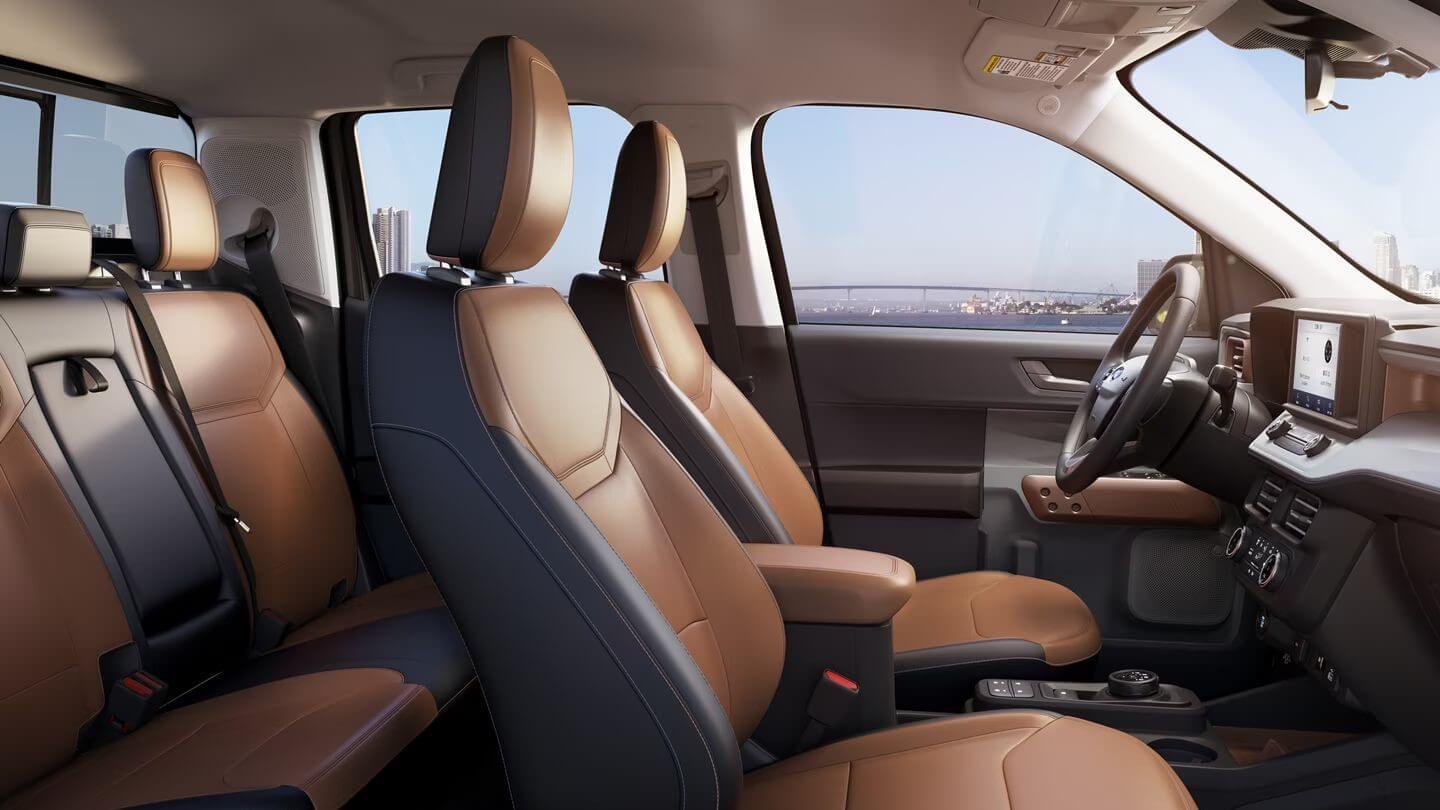 Interior shot of Ford Maverick LARIAT® cabin showing the front and passenger row seats