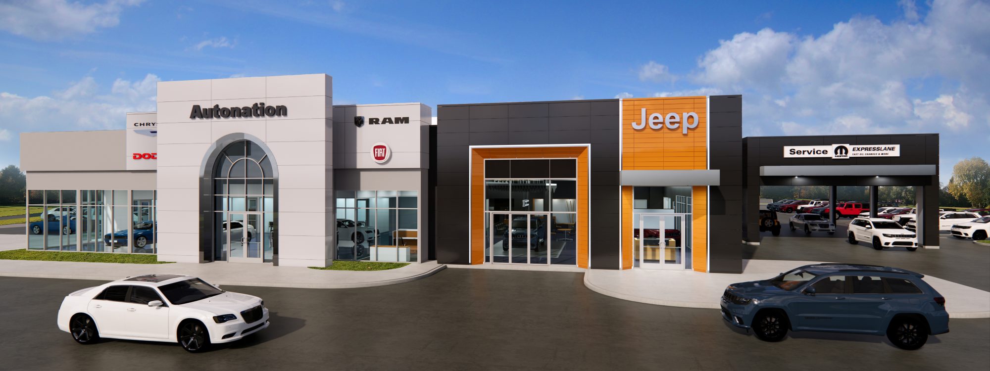 Exterior view of AutoNation Chrysler Dodge Jeep Ram & Fiat Columbus during the day. There is a clear blue sky, and a white truck parked in front of the building, which has white, grey, and red facings.