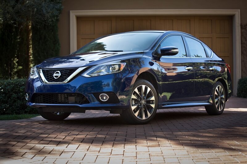The Nissan Sentra, an affordable car under $20,000 Image of a blue Nissan Sentra in a brick driveway