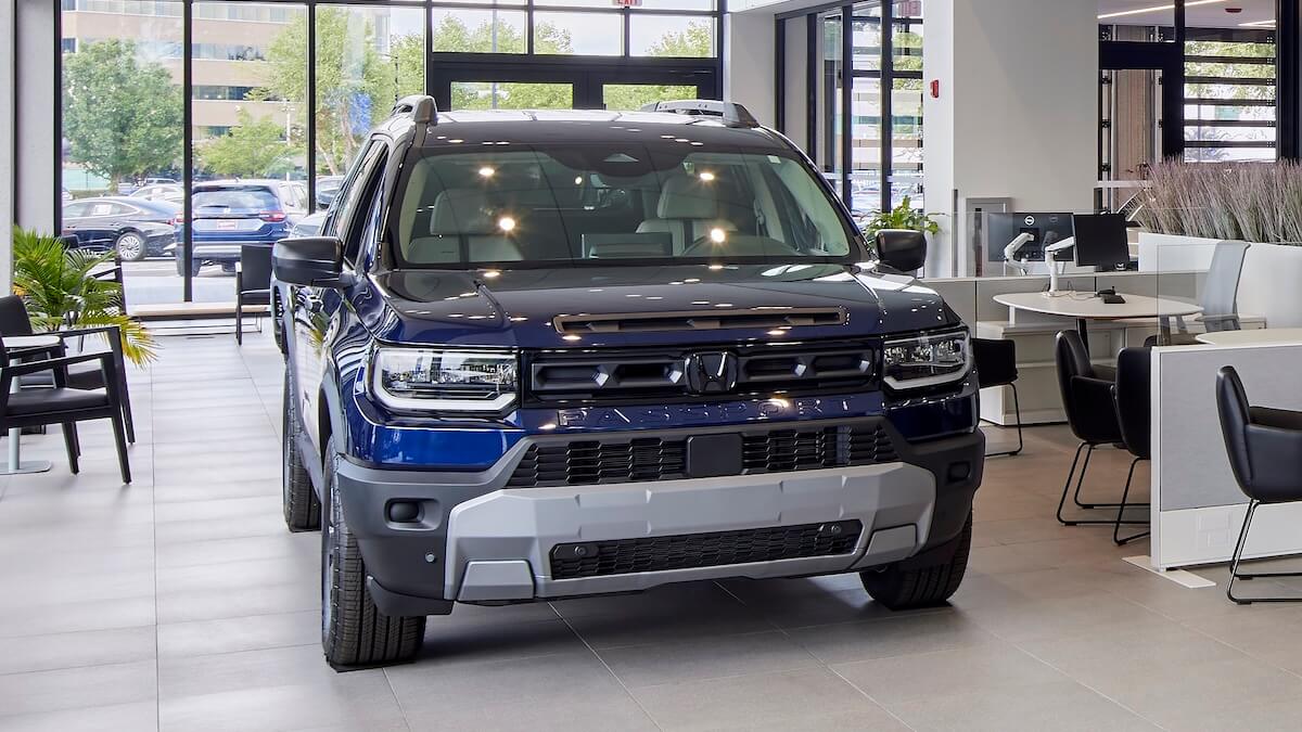 AutoNation Honda West Knoxville showroom with a new Honda SUV