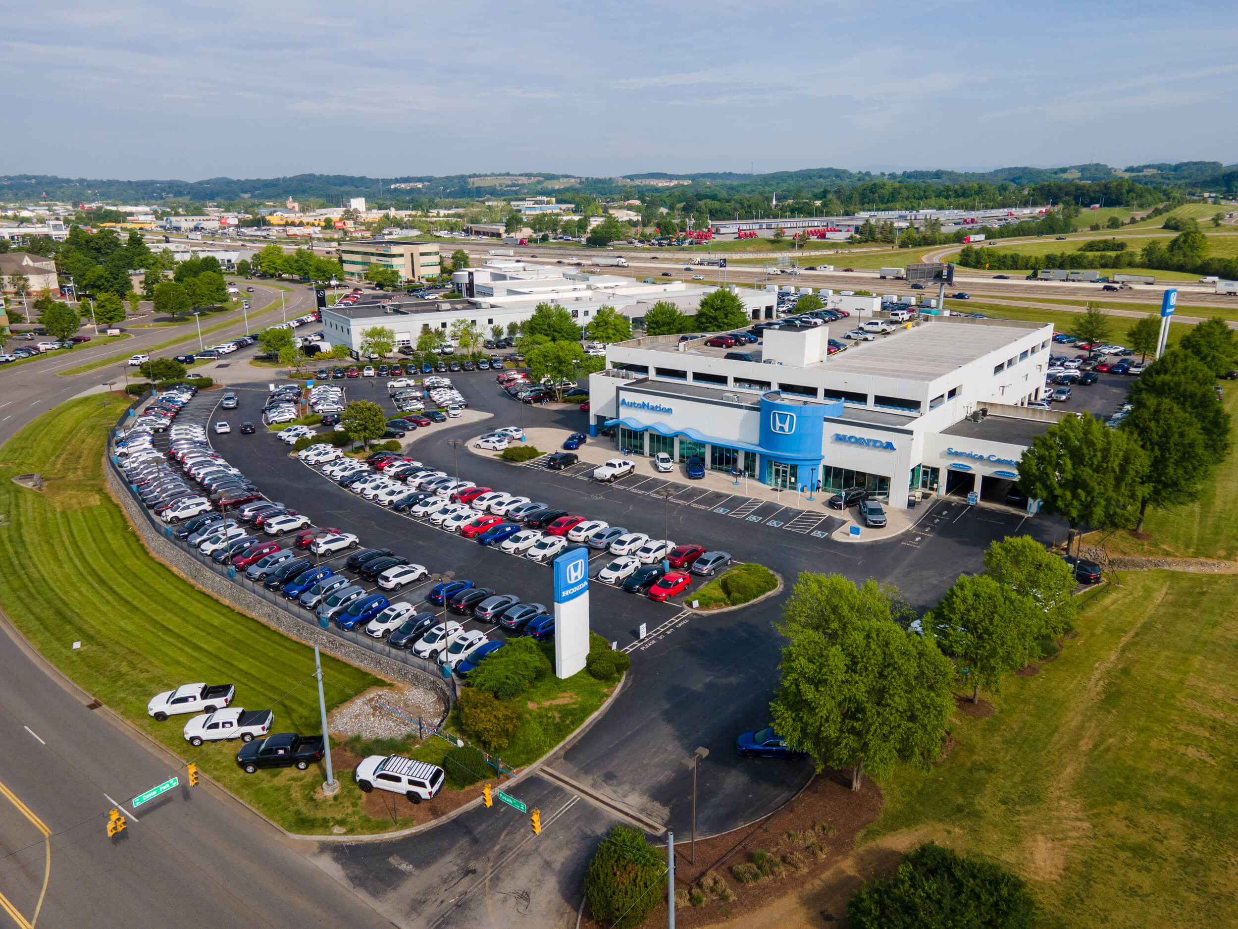 AutoNation Honda West Knoxville sells, services, and finances new and used Honda cars, trucks, and SUVs near you Aerial view of AutoNation Honda West Knoxville