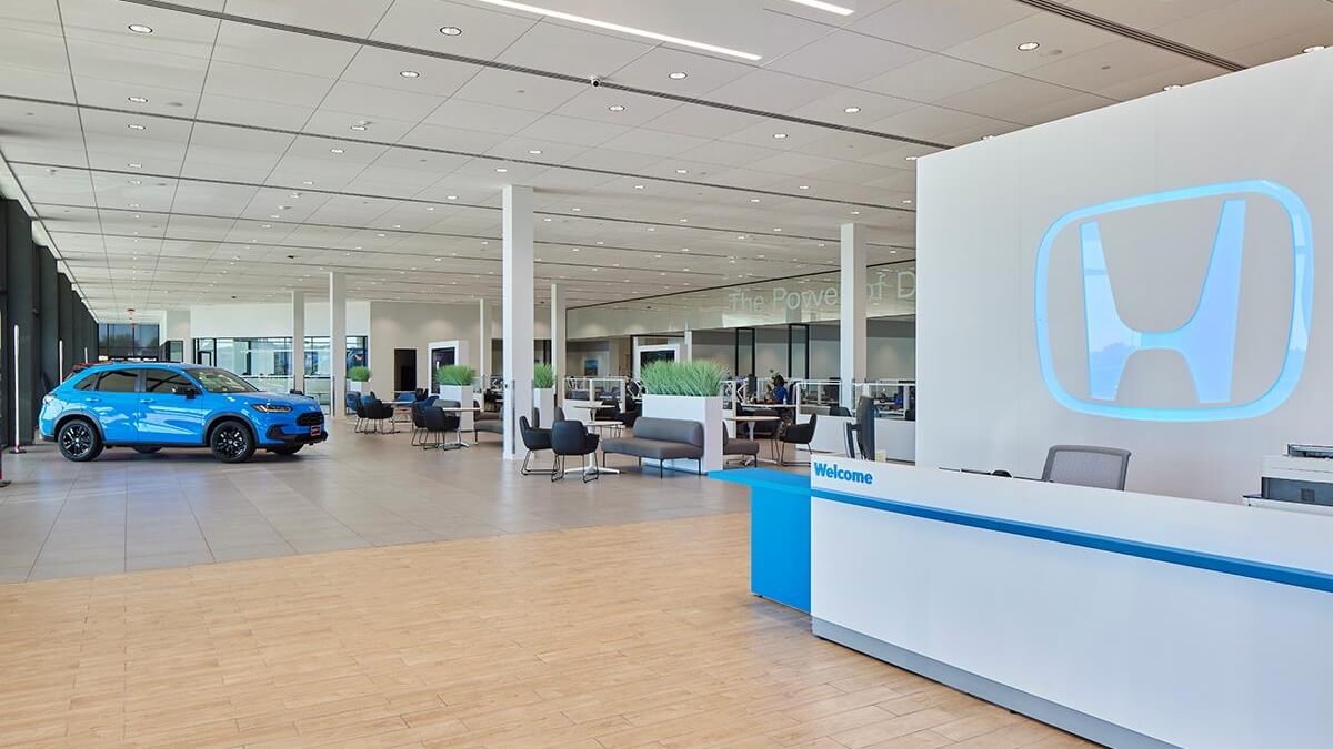 AutoNation Honda Lewisville showroom with a new Honda vehicle