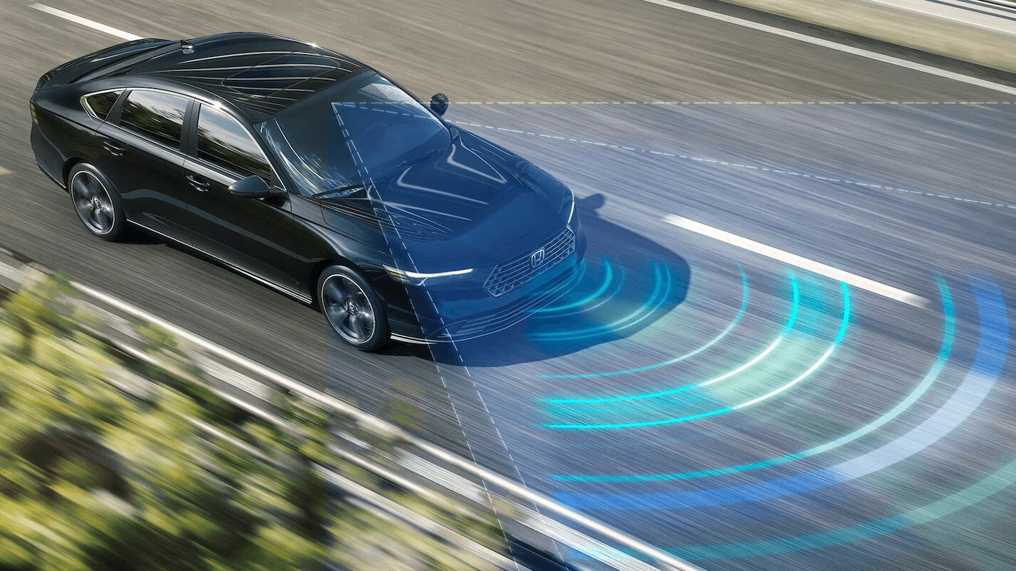 Learn about some of the features of Honda Sensing® safety and driver-assistive technology Rendered image of a Honda Accord with Honda Sensing® in use