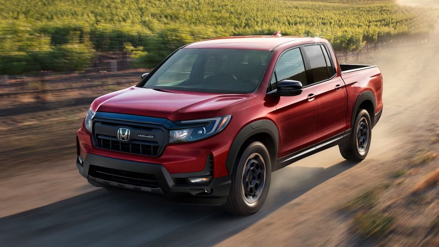Learn about the specs & features of the Honda Ridgeline Truck Honda Ridgeline Sport in Radiant Red Metallic II