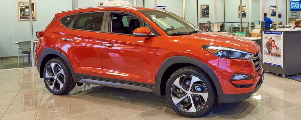 AutoNation Hyundai 104 Finance Center Shot of AutoNation Hyundai 104's finance center and Hyundai vehicle for sale