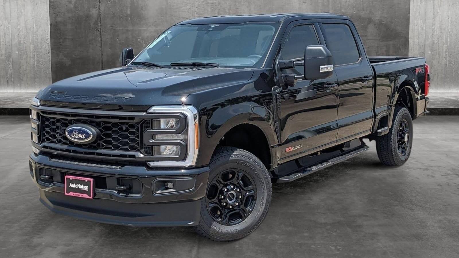 Compare the Ford F-150 and the Ford Super Duty F-250 2023 Ford Super Duty F-250 XLT in Agate Black Metallic