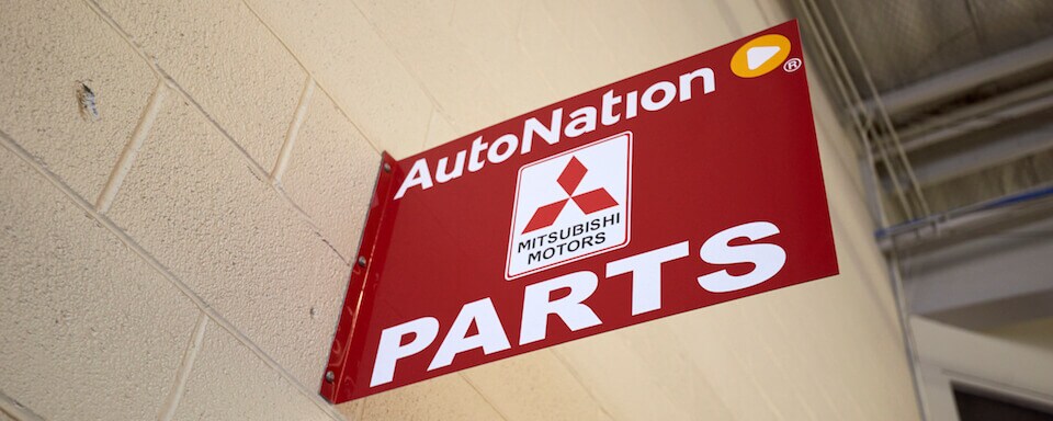 Mitsubishi Parts Center in Houston red sign of AutoNation Mitsubishi Parts Center id=