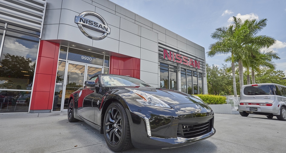 Exterior entrance to AutoNation Nissan Brandon dealer during the day