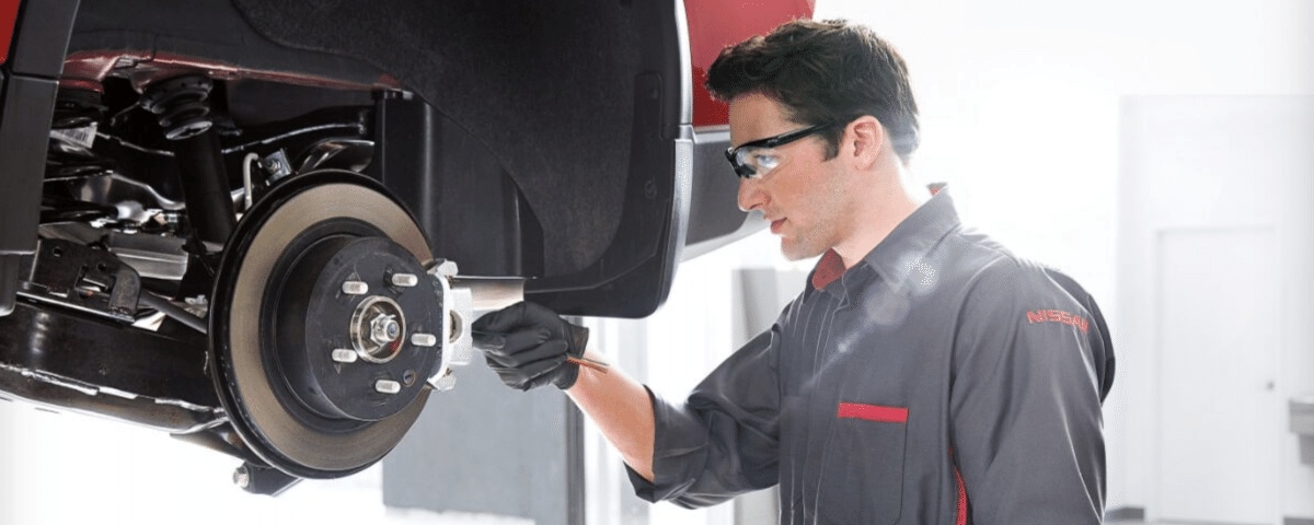 Nissan Brake Service Nissan technician performing brake service