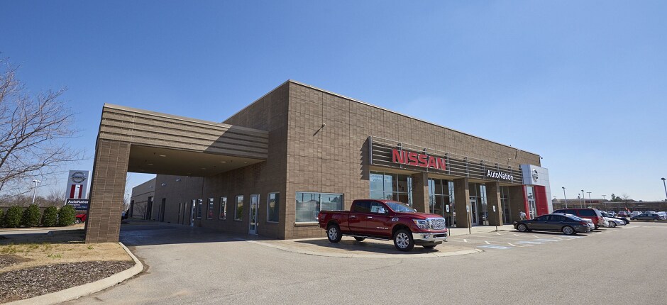 About AutoNation Nissan Memphis Exterior entrance to AutoNation Nissan Memphis dealer during the day