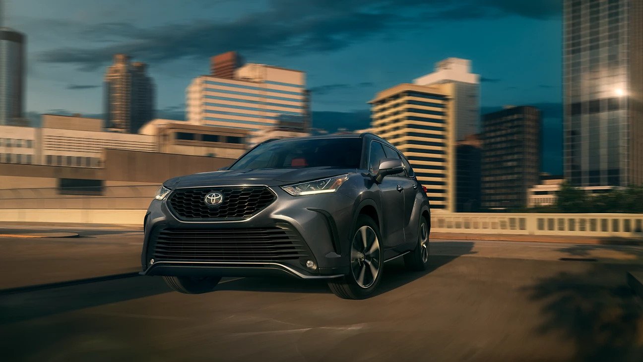 2022 Highlander for sale at AutoNation Toyota Corpus Christi today! Toyota Highlander driving through urban city