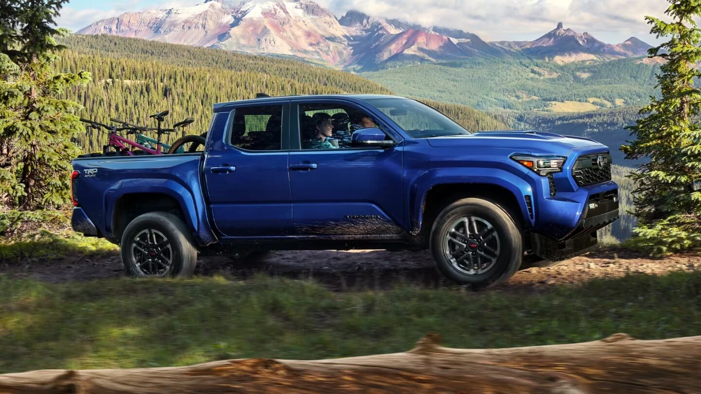 Learn about the Toyota Tacoma Truck Bed Dimensions Exterior shot of Blue Toyota Tacoma Truck
