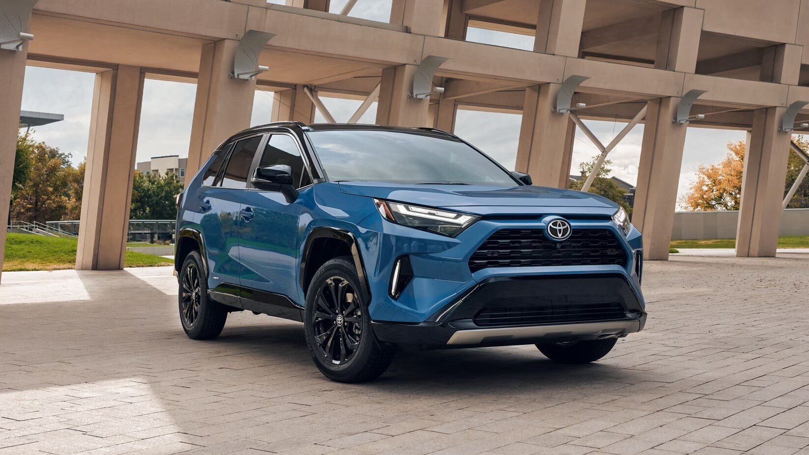 Find your trade-in value today! An image of a Toyota RAV4 parked outside