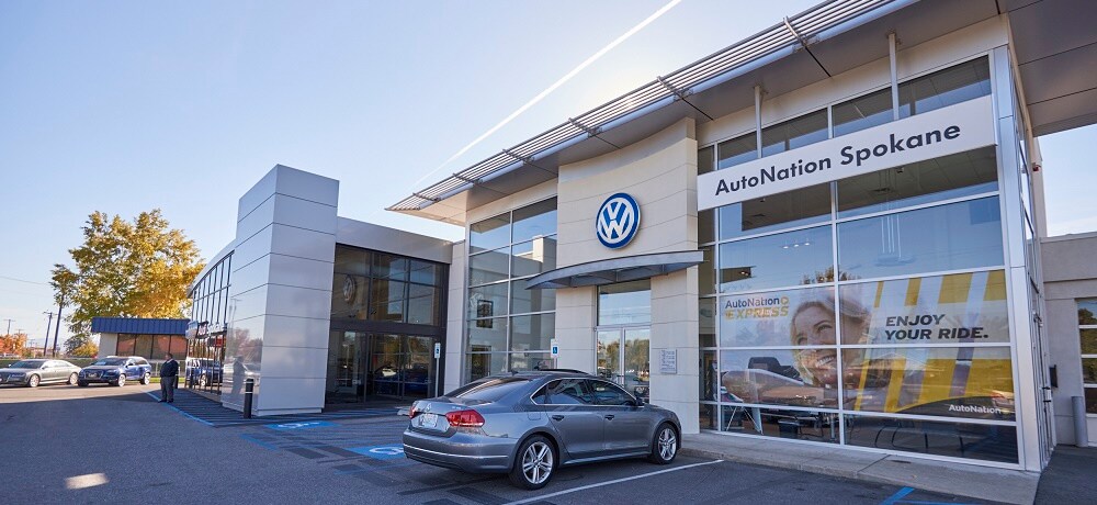 About AutoNation Volkswagen Spokane Exterior entrance to AutoNation Volkswagen Spokane dealer during the day