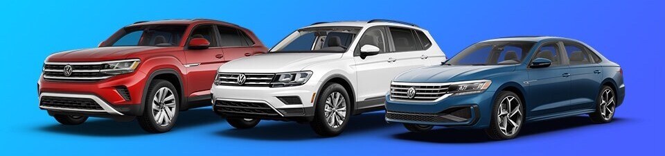 Red, white, and blue VW models