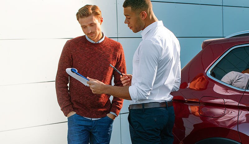 VW service advisor with customer