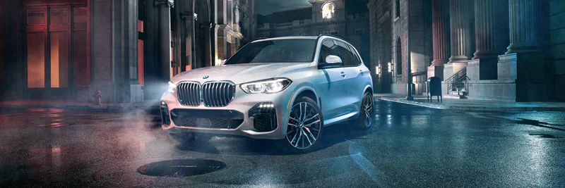 BMW X7 on foggy street at night.jpg