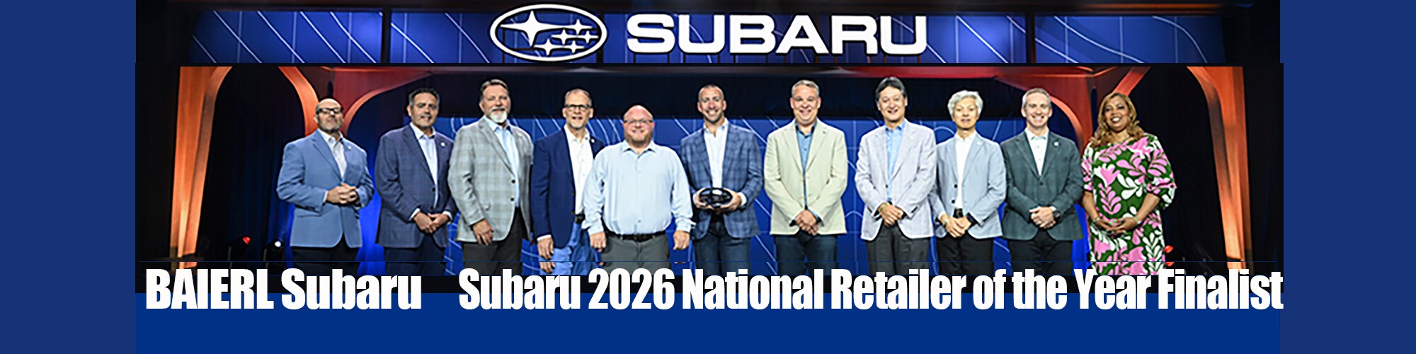 5%20-%20BAIERL%20Subaru%20banner%202000x500%20Retailer%20of%20Year%20on%20Stage.png