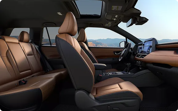 Tan leather-trimmed front and rear seats inside the 2026 Outback