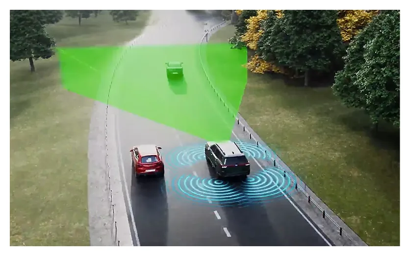A green detection cone projected ahead of a Subaru Outback tracking the car in front