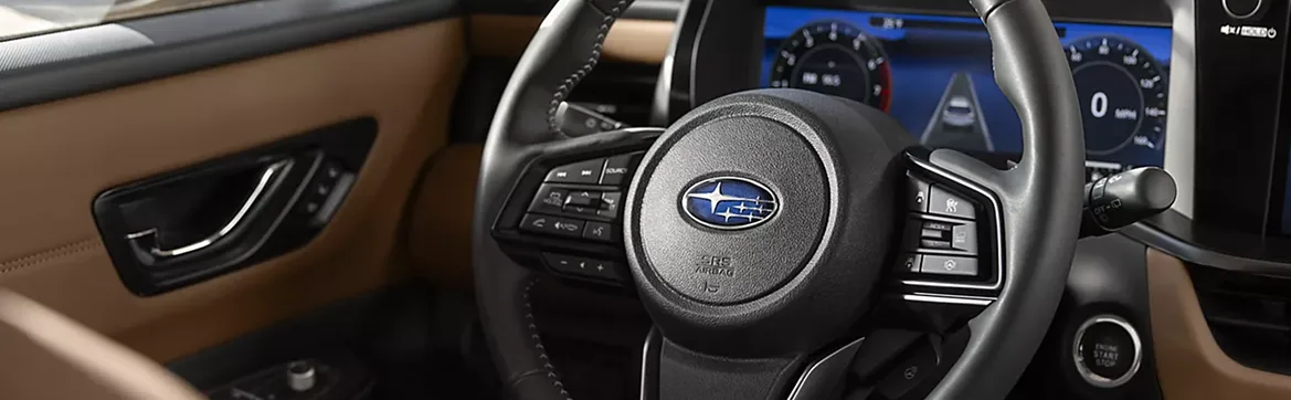 Driver’s view of the Outback steering wheel and digital instrument cluster