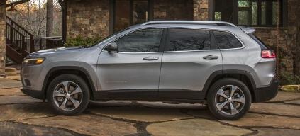 2020 Jeep Cherokee SUV Limited silved parked in from of house on stone driveway_2.JPG