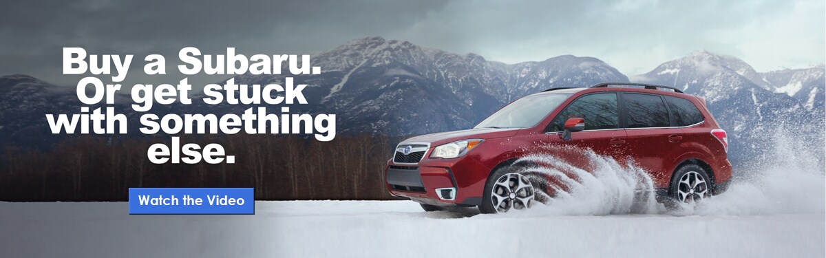 buy a subaru or get stuck with something else Red Subaru Forester in snow