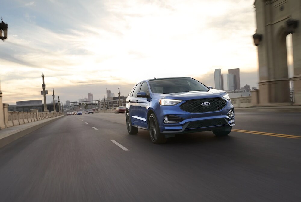 The 2021 Ford Edge leaving a city..png